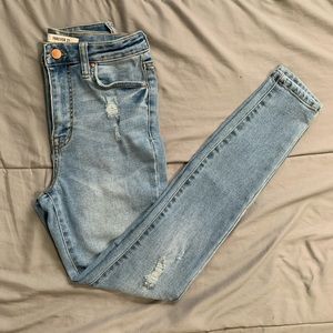 High waisted distressed jeans
